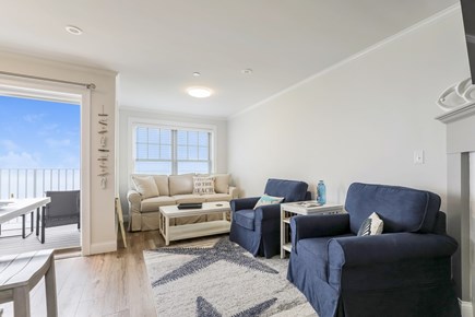 Dennis Port Cape Cod vacation rental - Living room with Couch and chairs with entrance to balcony - 405 Old Wharf Road-Dennisport Cape Cod- New England Vacation Rentals