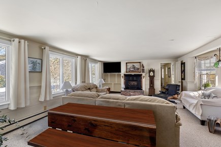 Eastham, Sand Dollar Cape Cod vacation rental - The living room offers a table, Smart TV, & comfortable seating