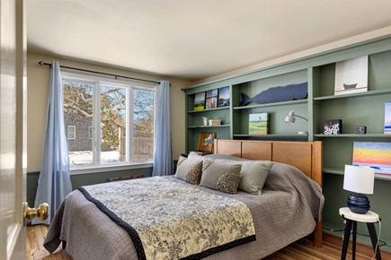 Eastham, Sand Dollar Cape Cod vacation rental - Second queen bedroom with built in shelves, coastal art