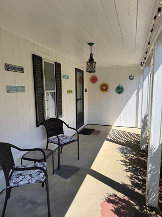 Eastham, Sand Dollar Cape Cod vacation rental - The farmer's porch is perfect for enjoying your morning coffee