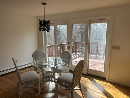 Eastham Cape Cod vacation rental - Dining area with deck access
