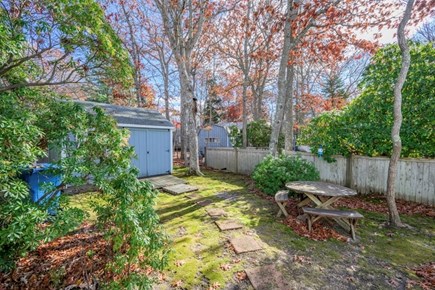 Falmouth Cape Cod vacation rental - Shed with inflatable SUPs, beach chairs, and bikes for guest use.