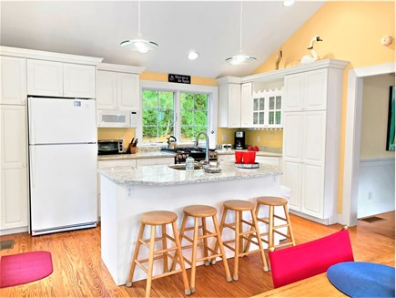 Chatham Cape Cod vacation rental - Eating area. Dining table and breakfast bar-Plenty of seating for the entire family- 58 Longs Lane Chatham Cape Cod New England Vacation Rentals