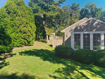 Chatham Cape Cod vacation rental - Side view of Sunroom and backyard with spacious enclosed outdoor shower - 58 Longs Lane Chatham Cape Cod New England Vacation Rentals