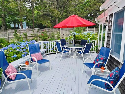 Chatham Cape Cod vacation rental - Outdoor deck with plenty of seating, table, umbrella and charcoal grill - 58 Longs Lane Chatham Cape Cod New England Vacation Rentals