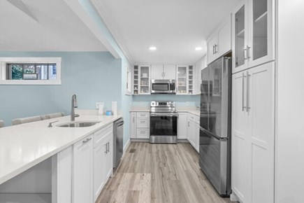 Falmouth Cape Cod vacation rental - Kitchen with stone countertops and stainless appliances
