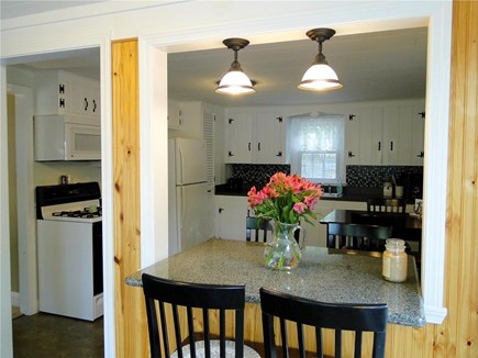 South Dennis Cape Cod vacation rental - Kitchen area view from the sun room
