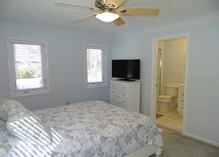 Brewster, Ocean Edge Resort Cape Cod vacation rental - Upstairs queen suite with TV, ceiling fan