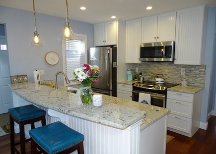 Brewster, Ocean Edge Resort Cape Cod vacation rental - Kitchen offers breakfast bar, updated amenities 