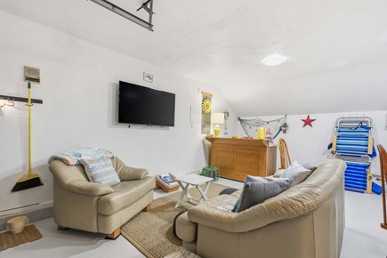 West Dennis Cape Cod vacation rental - Comfy wide couches with large screen TV perfect for kids