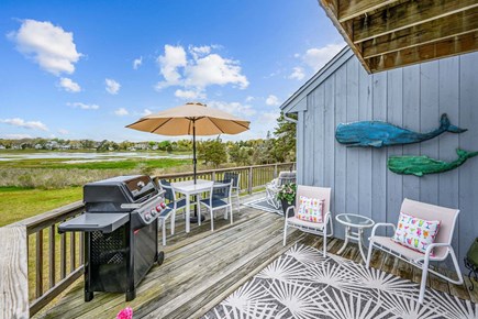 West Dennis Cape Cod vacation rental - Beautiful deck with dining table and lounge chairs