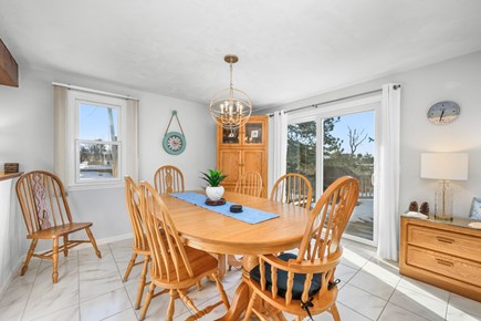 West Dennis Cape Cod vacation rental - Bright and welcoming dining area with a view of the deck