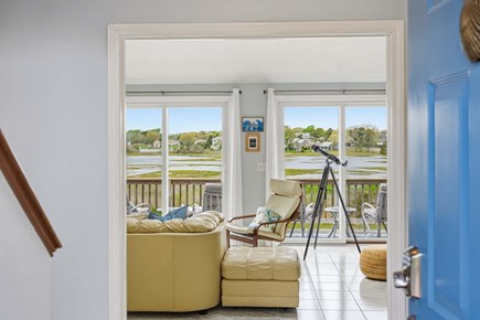 West Dennis Cape Cod vacation rental - View of the open living area with  beautiful views of the water