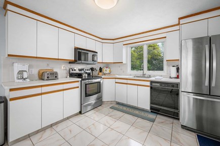 West Dennis Cape Cod vacation rental - Roomy, well-equipped kitchen, perfect for preparing meals with family and friends.