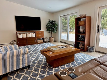South Orleans Cape Cod vacation rental - Family Room tv & direct access to spacious patio