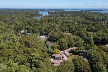 South Orleans Cape Cod vacation rental - Aerial looking above house out to Pleasant Bay