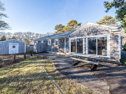 South Dennis Cape Cod vacation rental - Huge fenced backyard, gas grill, corn hole, fire pit.