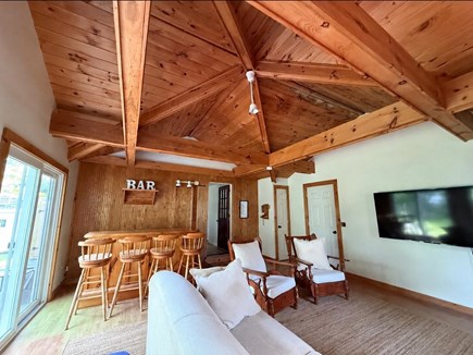 South Dennis Cape Cod vacation rental - BONUS ROOM! Awesome space with tv, bar and access to yard!
