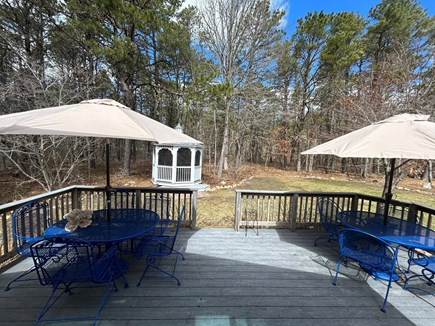 Yarmouth Cape Cod vacation rental - Large deck overlooking wooded yard as well as pretty paved patio