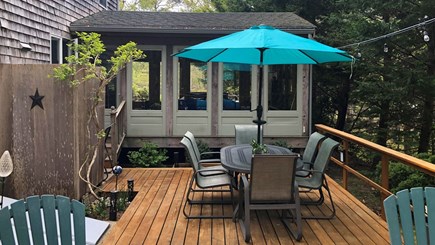 Wellfleet Cape Cod vacation rental - Deck with enclosed outdoor shower and screen porch beyond