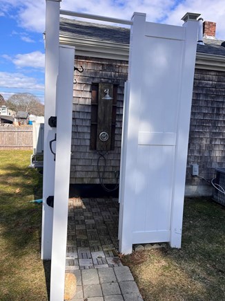 Bourne, Buzzards Bay Cape Cod vacation rental - Stone walkway leads to ultra-private outdoor shower