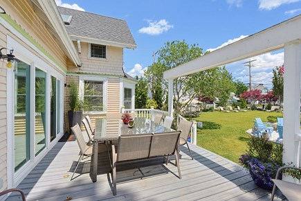 Onset Beach MA vacation rental - Large dining area overlooking <br/>the lovely yard