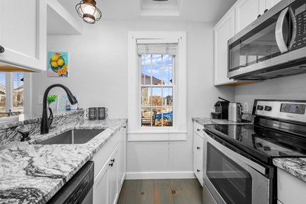 Mashpee Cape Cod vacation rental - Charming Kitchen – Compact and inviting, with modern appliances