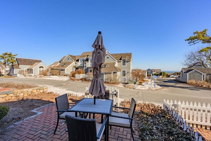 Mashpee Cape Cod vacation rental - Front patio with peek-a-boo view of the beach across the street