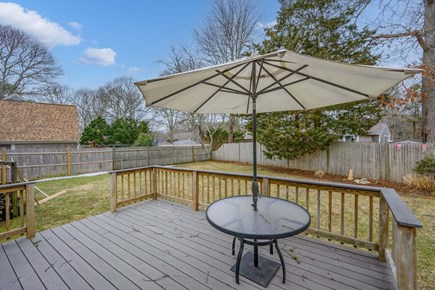 Centerville Cape Cod vacation rental - Back deck with dining area