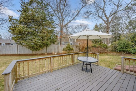 Centerville Cape Cod vacation rental - Back deck with dining area