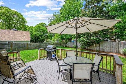 Centerville Cape Cod vacation rental - Deck with outdoor dining and seating area