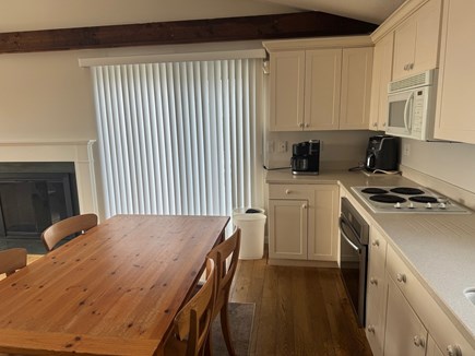 Truro Cape Cod vacation rental - Kitchen with slider to deck