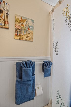 Yarmouth Cape Cod vacation rental - Thoughtfully arranged towels and coastal artwork.