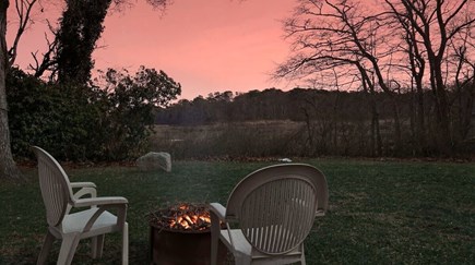 Yarmouth Port Cape Cod vacation rental - Fire pit at sunset over the marsh