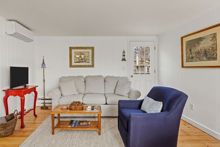 Orleans, 22 Beach Road Cottage Cape Cod vacation rental - Cozy sitting area, TV and entrance to back yard and deck.