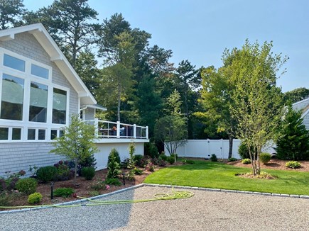 New Seabury, Mashpee Cape Cod vacation rental - Side yard with deck area