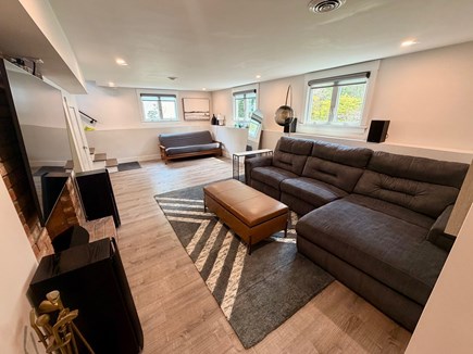 New Seabury, Mashpee Cape Cod vacation rental - TV room with sectional recliner and convertible futon sofa