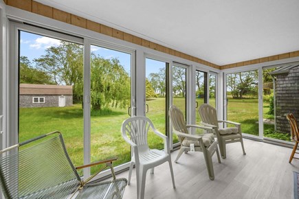Barnstable Cape Cod vacation rental - Screened in porch with views of the backyard