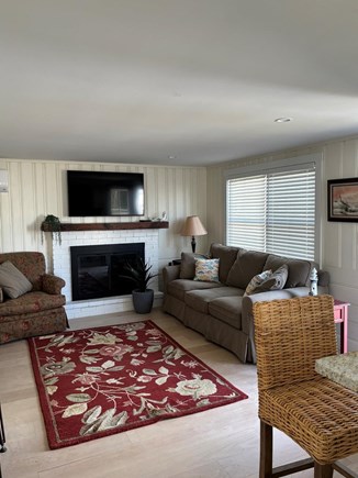 Popponesset Cape Cod vacation rental - Open concept living kitchen with fireplace and smart TV