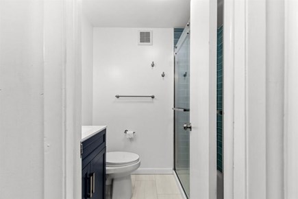 Wellfleet, Marshside Escape Cape Cod vacation rental - Ensuite full bath with glass shower and modern vanity