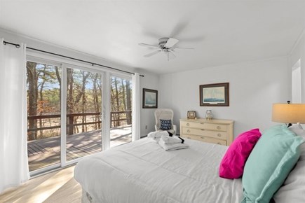Wellfleet, Marshside Escape Cape Cod vacation rental - Queen bedroom with sliders opening to the deck