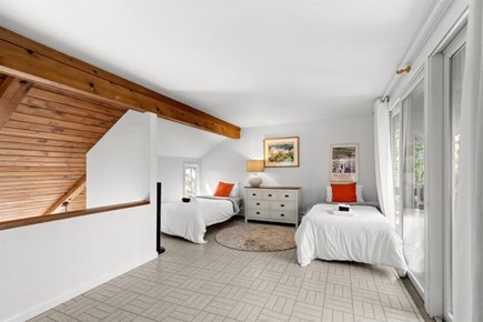 Wellfleet, Marshside Escape Cape Cod vacation rental - Open loft sleeping area with twin beds and sitting space