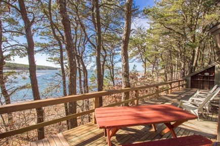 Wellfleet, Marshside Escape Cape Cod vacation rental - Waterfront deck with outdoor seating and scenic views