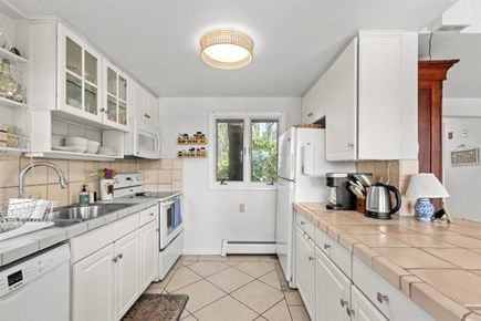 Wellfleet, Marshside Escape Cape Cod vacation rental - Bright galley kitchen with full appliances and prep space