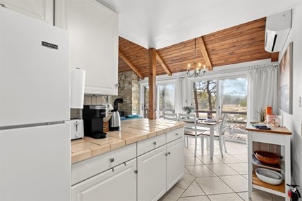 Wellfleet, Marshside Escape Cape Cod vacation rental - Kitchen opens to dining area and sunlit great room