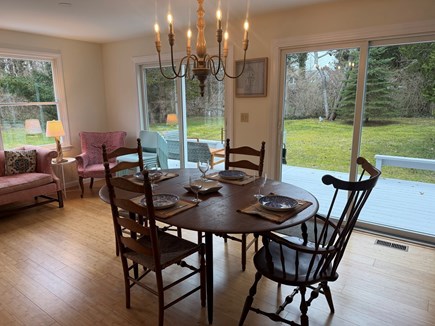 Orleans Cape Cod vacation rental - Dining area opens onto the deck and living room.