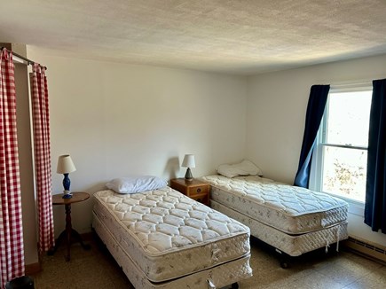 Eastham Cape Cod vacation rental - Master bedroom with half bath (curtains for privacy)