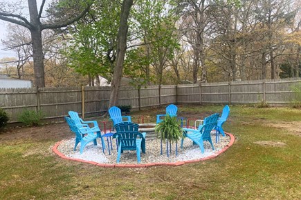 South Yarmouth Cape Cod vacation rental - Fully fenced in back yard with fire pit