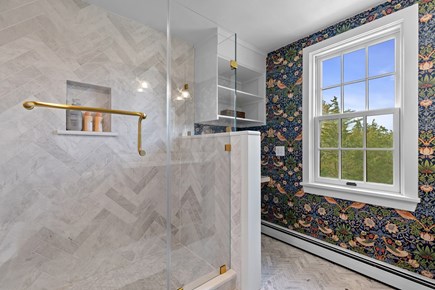 Eastham, Bridge Meadow Cape Cod vacation rental - Spa like shower with marble tile and brass finishes