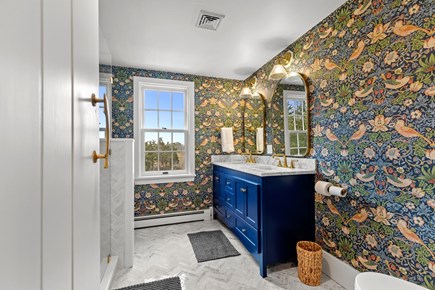 Eastham, Bridge Meadow Cape Cod vacation rental - Stylish bath with double vanity and bold wallpaper